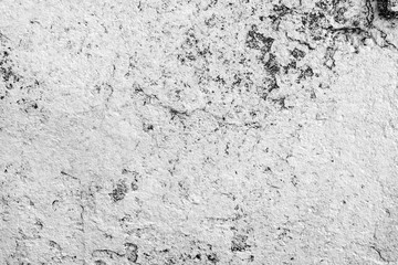 Texture of a concrete wall with cracks and scratches which can be used as a background