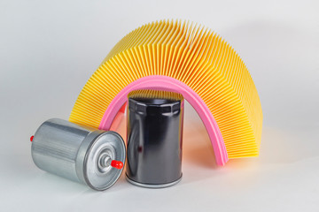 on white background. no insulation. spare parts for the car. air filter, oily, fuel