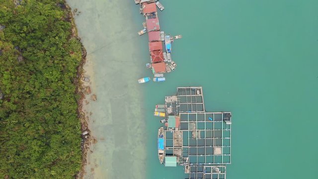 The traditional Cua Van Floating Village in Halong Bay, Vietnam