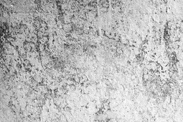 Texture of a concrete wall with cracks and scratches which can be used as a background