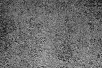 Texture of a concrete wall with cracks and scratches which can be used as a background