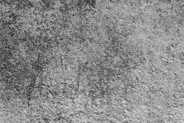 Texture of a concrete wall with cracks and scratches which can be used as a background