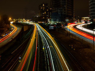 Obraz premium Light trails and urban view in East India, London stock photo