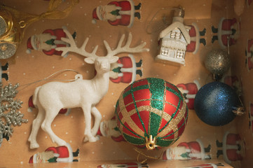 christmas box with different baubles