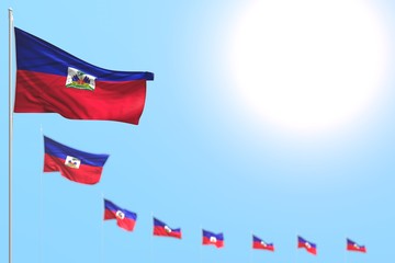 pretty many Haiti flags placed diagonal with bokeh and empty place for content - any feast flag 3d illustration..