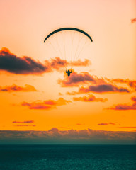 Paragliding at sunset