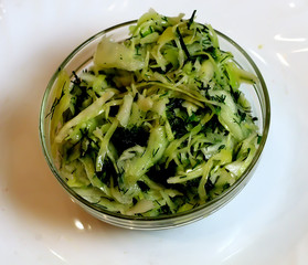 fresh salad in a bowl isolated on white
