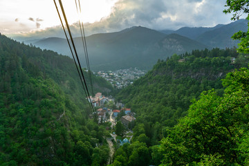 BORJOMI, GEORGIA - JUNE 27, 2019: One of the favorite tourist attractions in resort is the cable car ride over the Mineral Water Park and Borjomi