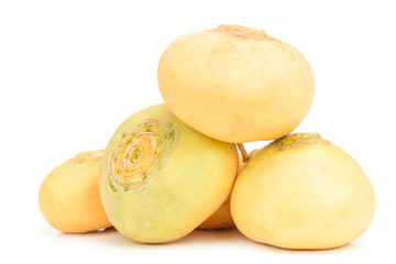 Fresh natural yellow turnip on a white isolated background close-up.