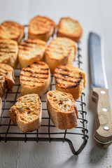 Tasty toasted wholegrain bread on a cooling sheet