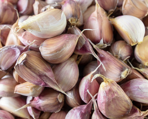 Cloves of garlic as a background