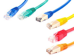 Colored network cables patch cords on white background