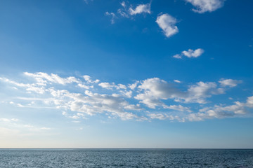 Naklejka na ściany i meble Landscape of sea horizon seascape under blue sky and cloud.