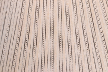 Punch cards. Close-up of a pile of unused vintage computer punch cards isolated on a white background. Technology in the sixties and seventies for data storage and programming. Macro.