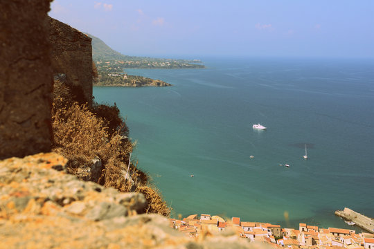 View of Cefalu town from the Rocca di Cefalu in early morning. Sicily, Italy. Retro style toned