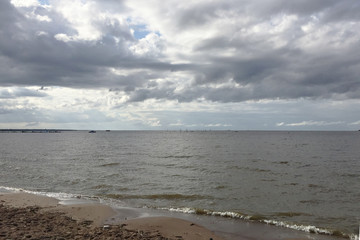On the shore of the Gulf of Finland in cloudy weather