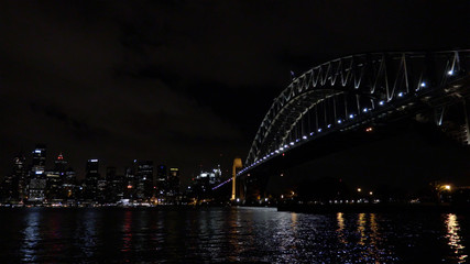 Naklejka na ściany i meble Sydney harbour bridge and city at night