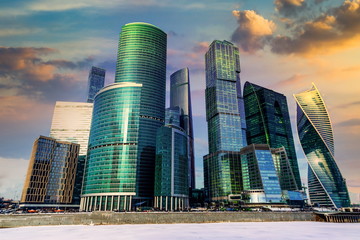 Modern skyscrapers of Moscow-City on the bank Moskva river at sunset.