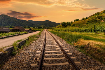 Railway under beautiful sky at sunset.
