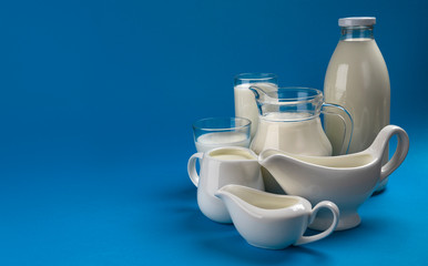 Collection of dairy products on blue wooden background