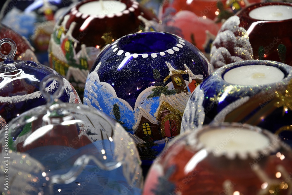 Wall mural Florence, December 2019: Handmade Christmas spheres and decorations at Christmas market in Piazza Santa Croce in the centre of Florence City. 