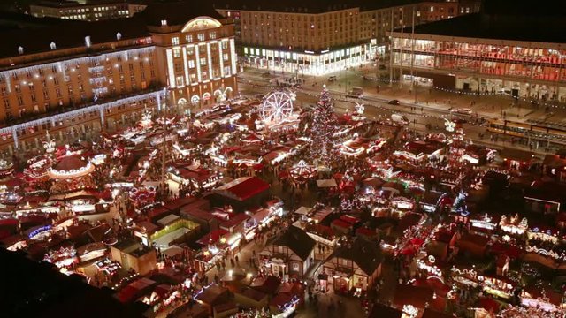 Christmas market in Dresden, Germany, Europe. Illuminated festive ornaments. Winter holidays background during Advent in December.