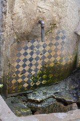 Antient fountain in Fez, Morocco