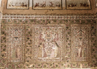 Orchha, Madhya Pradesh, India - March 2019: A beautiful, ancient, faded  mural inside the walls of the Raja Mahal, the old palace of the Bundela Rajputs. © Balaji