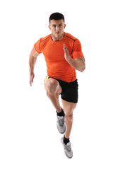 Athletic young man running on white background