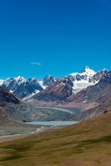 Himachal Pradesh, India - Sep 04 2019 -  Mt. Mulkila (6517m) view from Chandra Taal (Moon Lake) in Lahaul and Spiti, Himachal Pradesh, India.