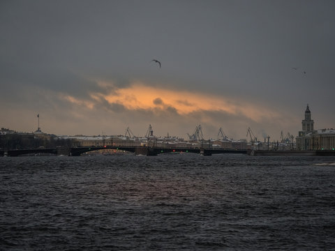 Dark cloudy landscape with a view of St. Petersburg.