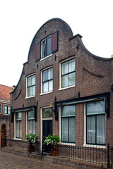 View of historical, traditional and typical house in Edam. It is a town famous for its semi hard cheese in the northwest Netherlands, in the province of North Holland.