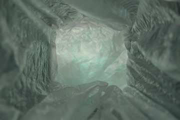 Beautiful abstract Tunnel background of plastic cellophane bag. No plastic bag concept saves the...
