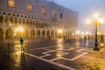 Mystical foggy early morning in Venice, Italy