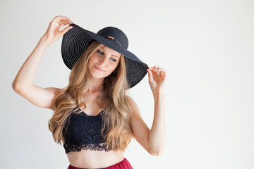 beautiful girl in a hat with a brim fashion