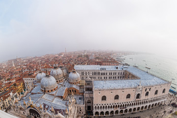 Foggy view from the top of Campanile di San Marco in the morning. Venice, Italy