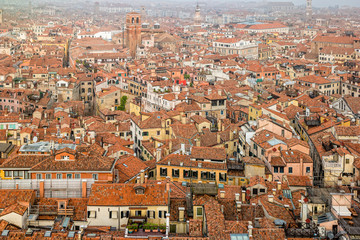 Fototapeta na wymiar Foggy view from the top of Campanile di San Marco in the morning. Venice, Italy