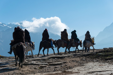 Himachal Pradesh, India - Sep 11 2019 - The tourists enjoying horse riding on Rohtang La (Rohtang Pass) in Manali, Himachal Pradesh, India.