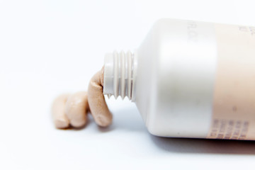 makeup and foundation that flows from a tube like a cream