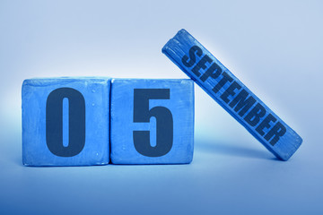 september 5th. Day 5 of month, Handmade wood cube calendar with date month and day in trendy...