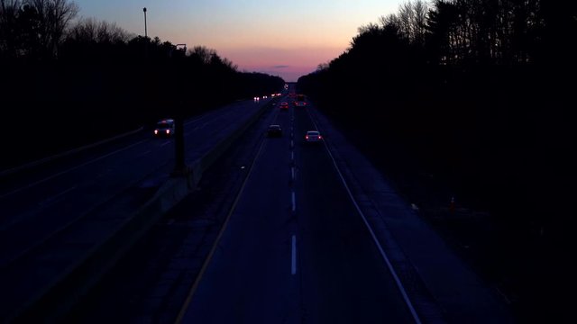 Overpass during sunset with truck going by, 1080p