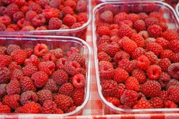 Fresh raspberries at a farmers market