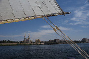 mosque by river nile against sky