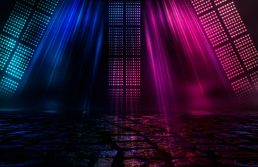 Empty background scene. Dark street reflection on wet asphalt. Rays of neon light in the dark, neon figures, smoke. Background of empty stage show. Abstract dark background.