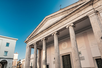 The cathedral of San Pietro Apostolo in Isernia. The facade with a large triangular tympanum in...