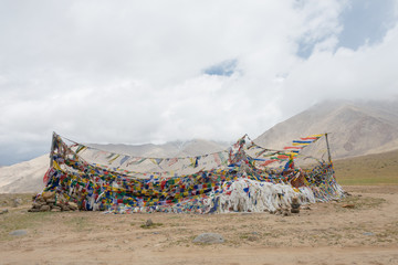 Ladakh, India - Jul 12 2019 - Tibetan prayer flag at Polokongka La Pass in Ladakh, Jammu and...