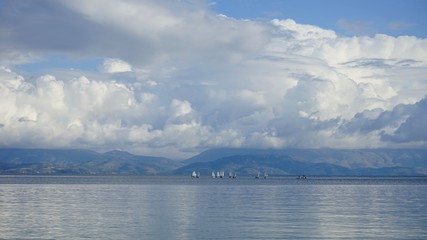 Greece, Corfu Island with clouds and sails                          sails