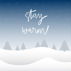 Stay warm hand lettering with winter background
