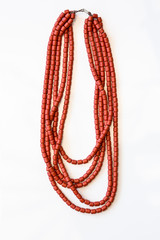 Traditional Ukrainian clay terracotta beads on a white background.