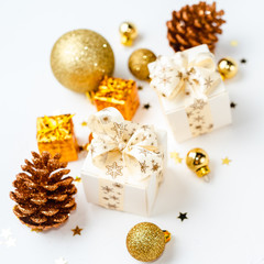 golden christmas balls on white background, christmas card